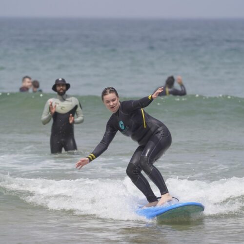 First surf lesson for beginners Tamraght beach Morocco