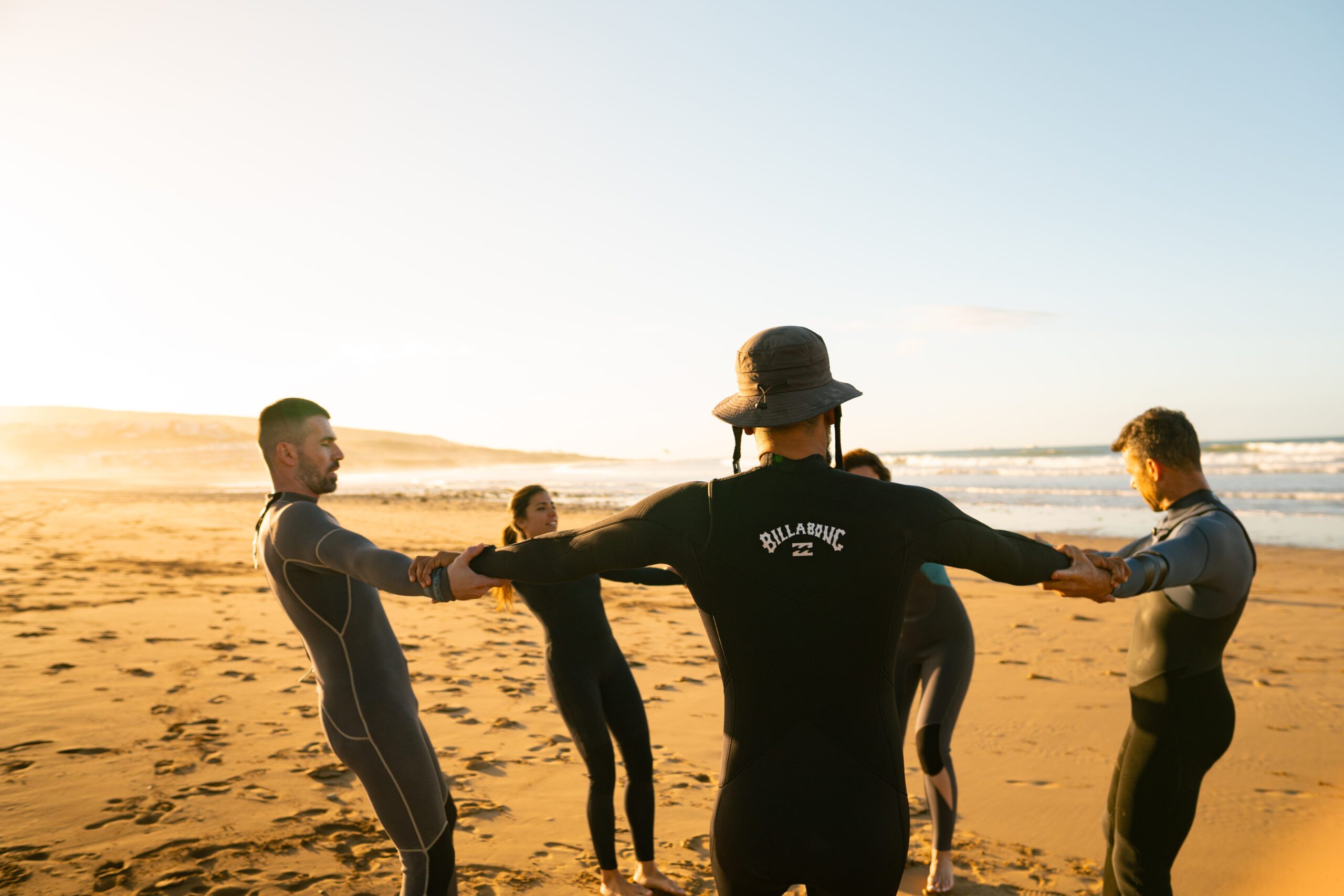 Intermediate surfer doing bottom turn Morocco Taghazout wave